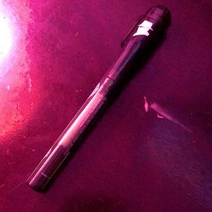 Spy pen, black and can write stuff with the invisible ink and can light up.
